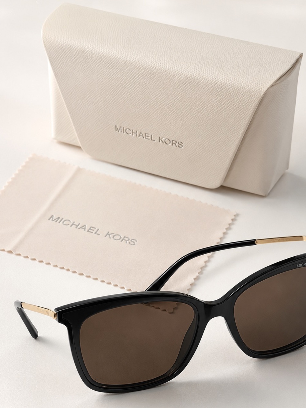 Michael Kors Women's Black Sunglasses with case included.